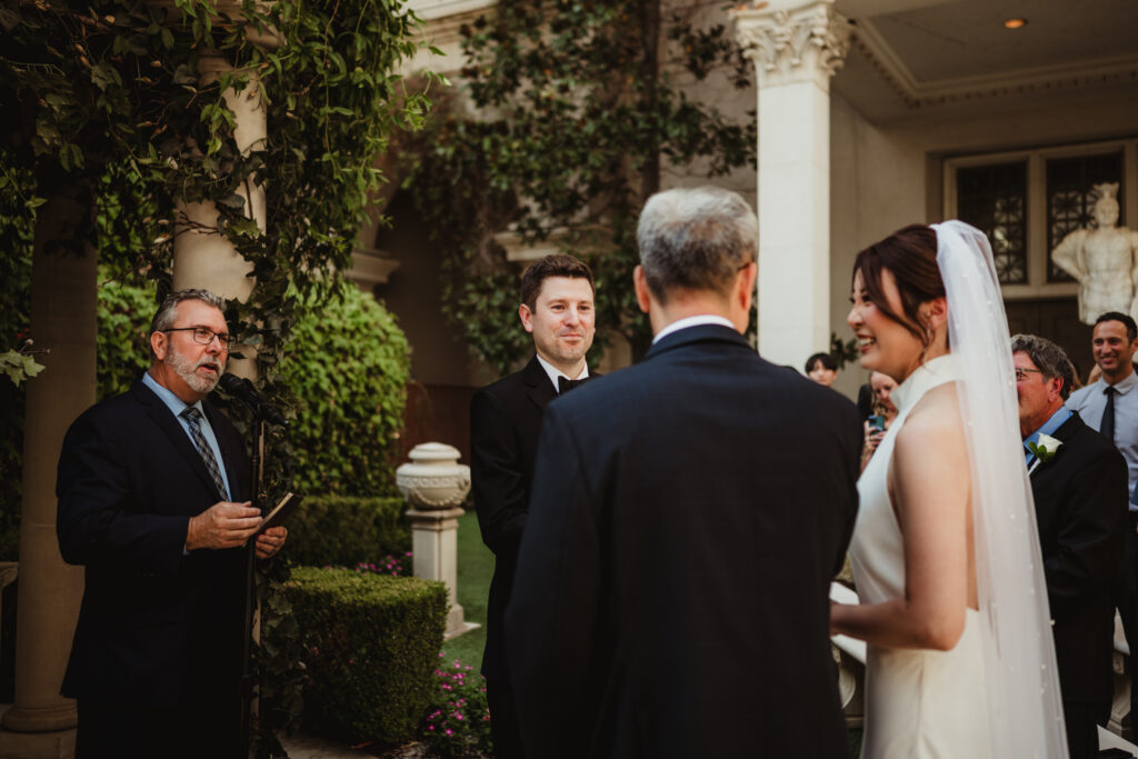 A summer intimate wedding at Caesars Palace and Carmine’s in Las Vegas, by Vegas Wedding Visuals - a Vegas elopement photo/video team.