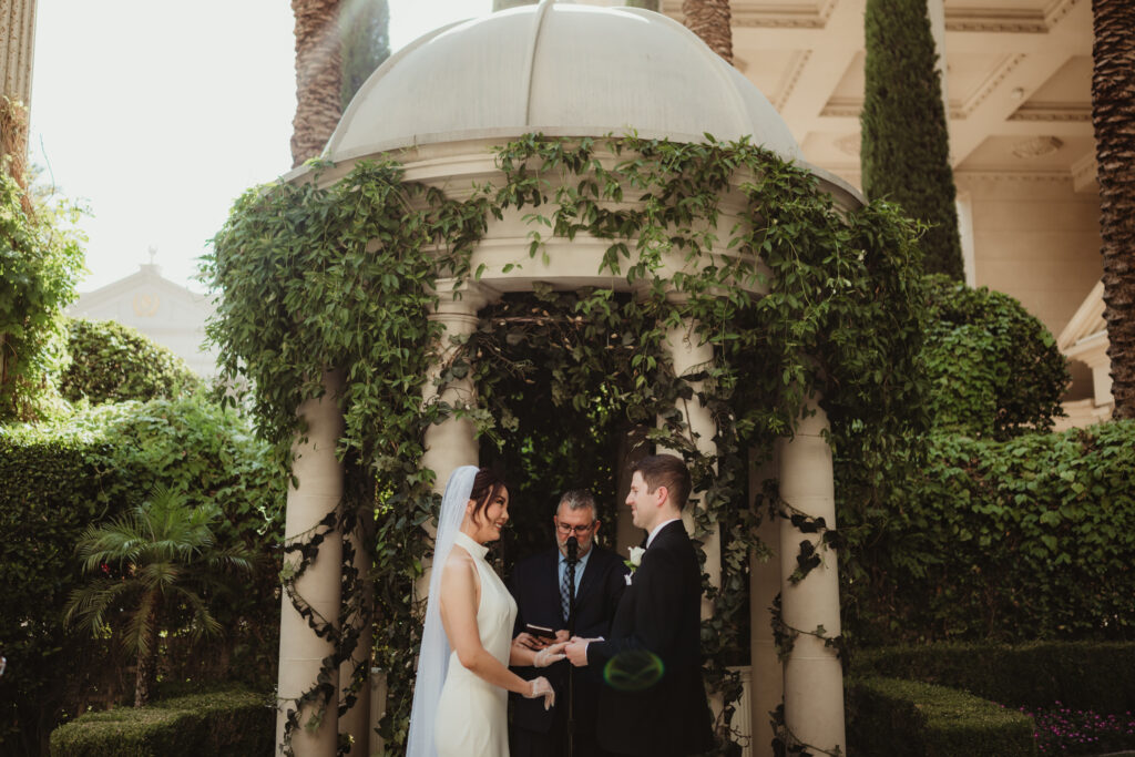 A summer intimate wedding at Caesars Palace and Carmine’s in Las Vegas, by Vegas Wedding Visuals - a Vegas elopement photo/video team.