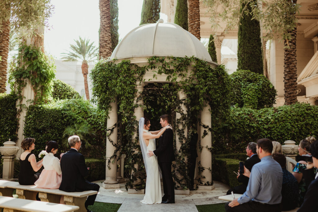 A summer intimate wedding at Caesars Palace and Carmine’s in Las Vegas, by Vegas Wedding Visuals - a Vegas elopement photo/video team.