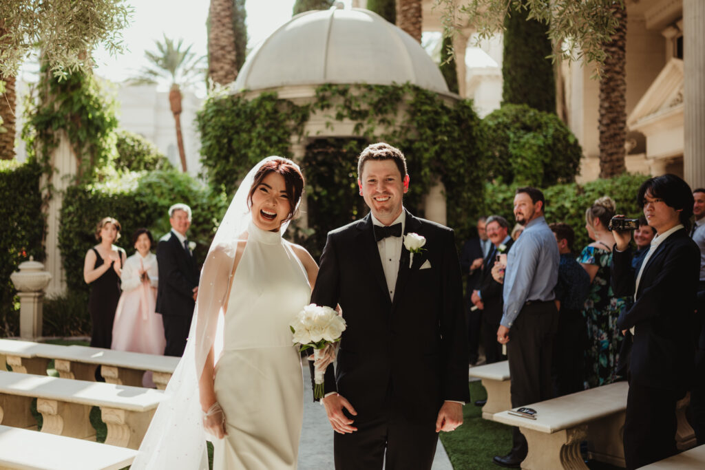 A summer intimate wedding at Caesars Palace and Carmine’s in Las Vegas, by Vegas Wedding Visuals - a Vegas elopement photo/video team.