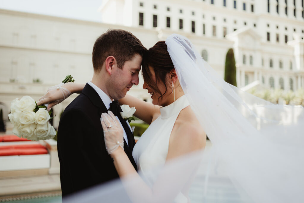 A summer intimate wedding at Caesars Palace and Carmine’s in Las Vegas, by Vegas Wedding Visuals