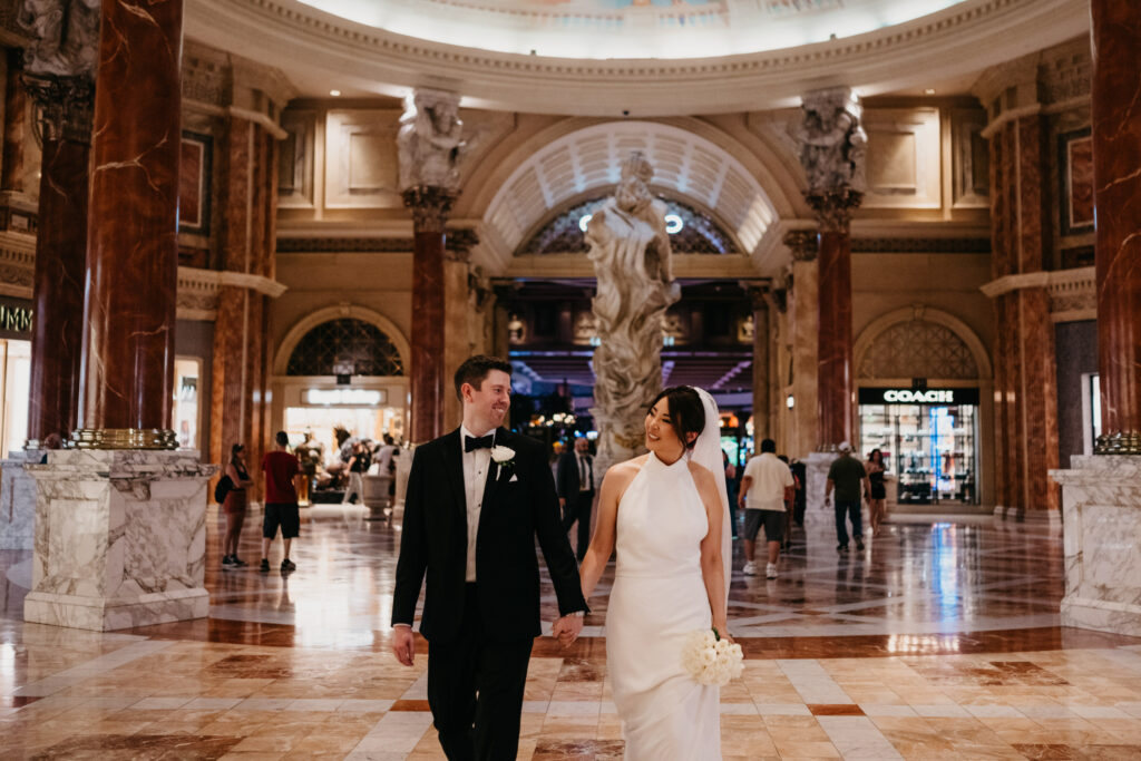 A summer intimate wedding at Caesars Palace and Carmine’s in Las Vegas, by Vegas Wedding Visuals - a Vegas elopement photo/video team.